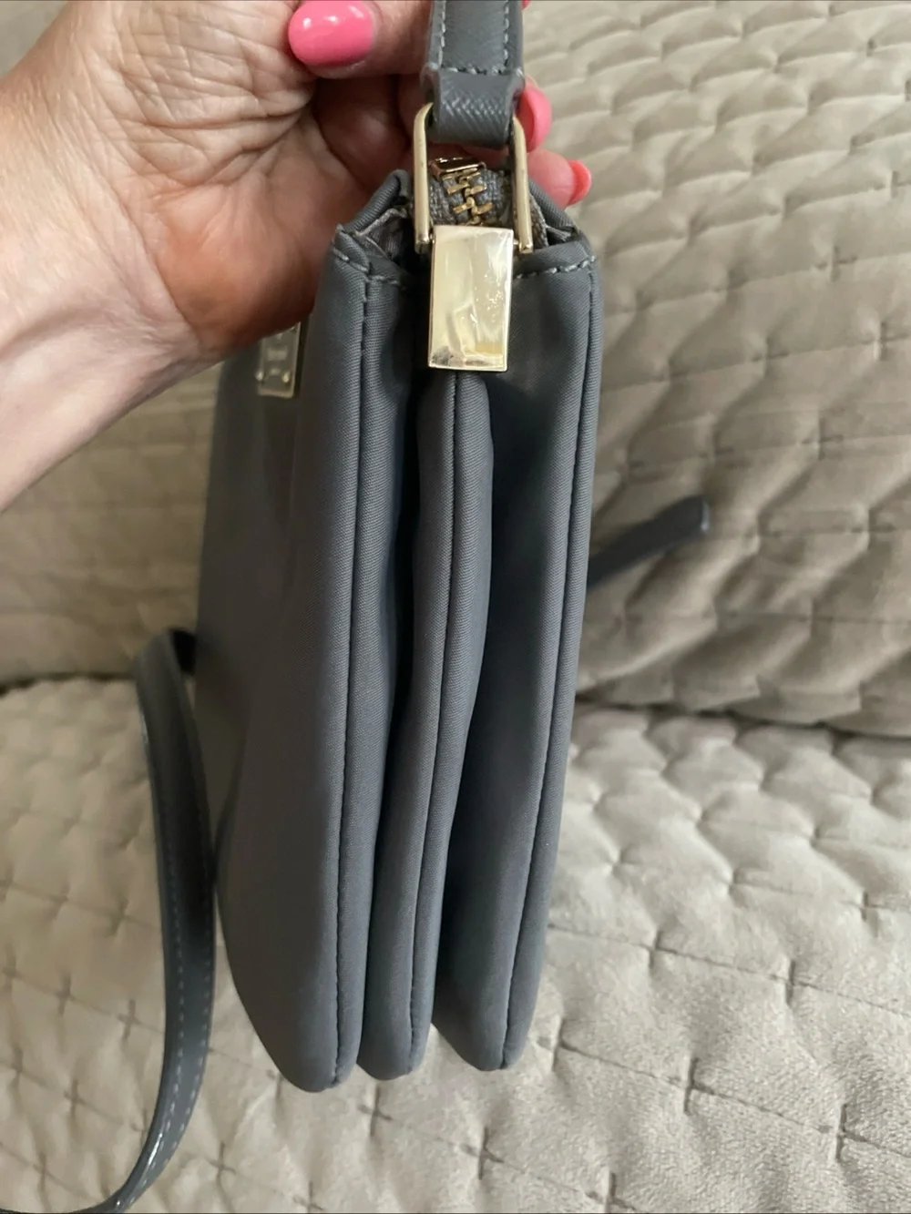 kate spade gray nylon crossbody with gold logo plaque
